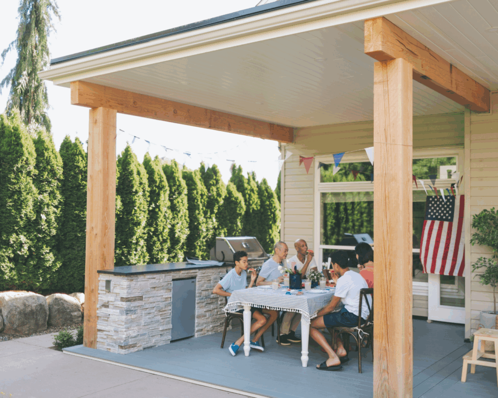 Family having cookout on clean patio.